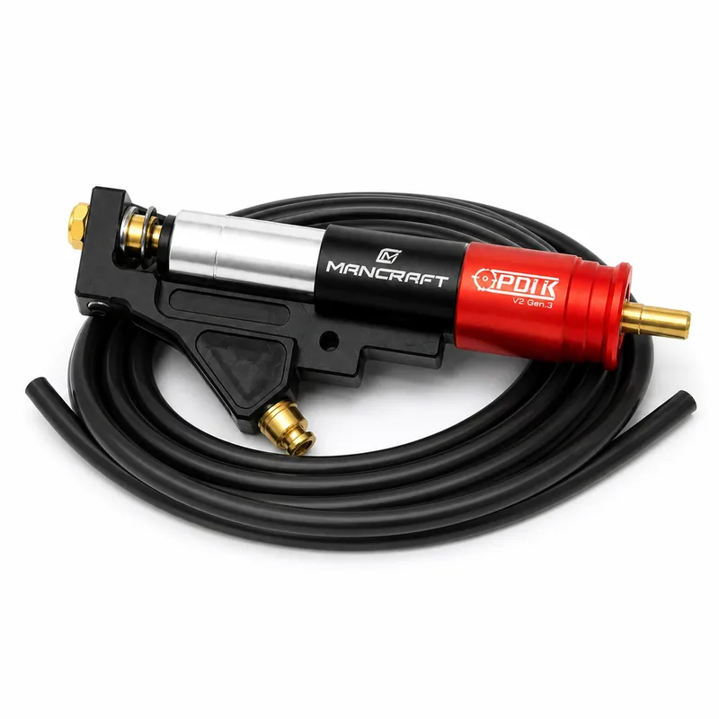 Mancraft PDiK V2 Gen.3, moteur HPA seul posé sur flexible pneumatique noir enroulé